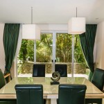 Three-Bedroom Suan Tua Apartment Layan-Dining area with garden view